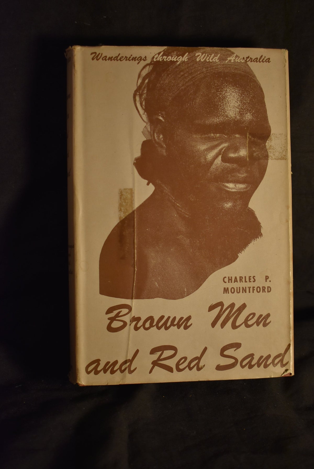 Brown Men and Red Sand