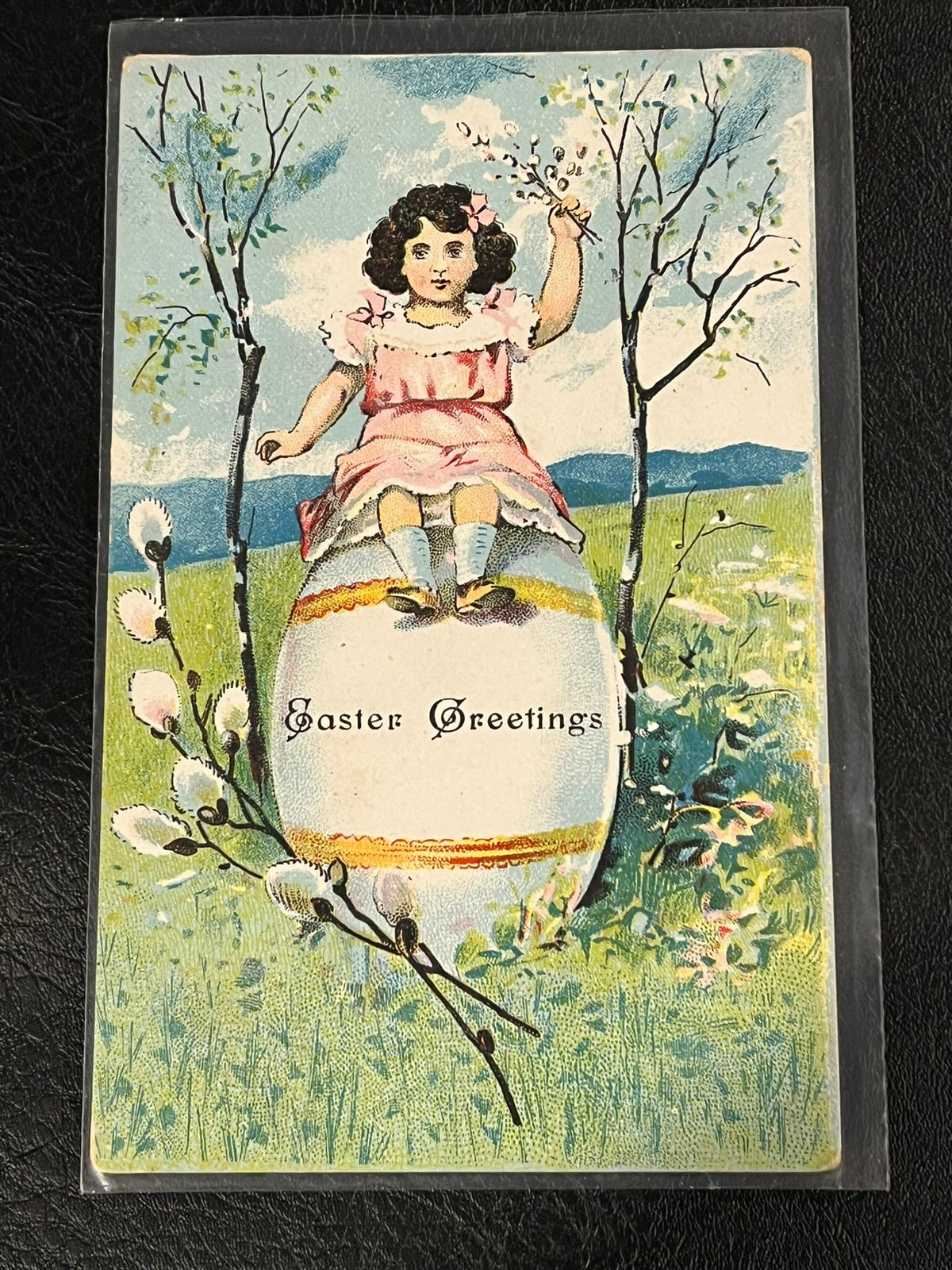 Easter Greetings - girl on huge egg