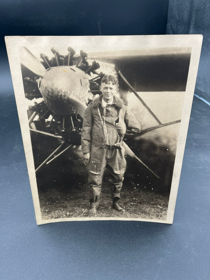 Charles Lindbergh in front of plane