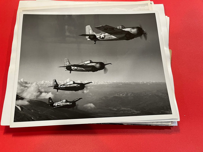 WWII Fighter Planes in formation.