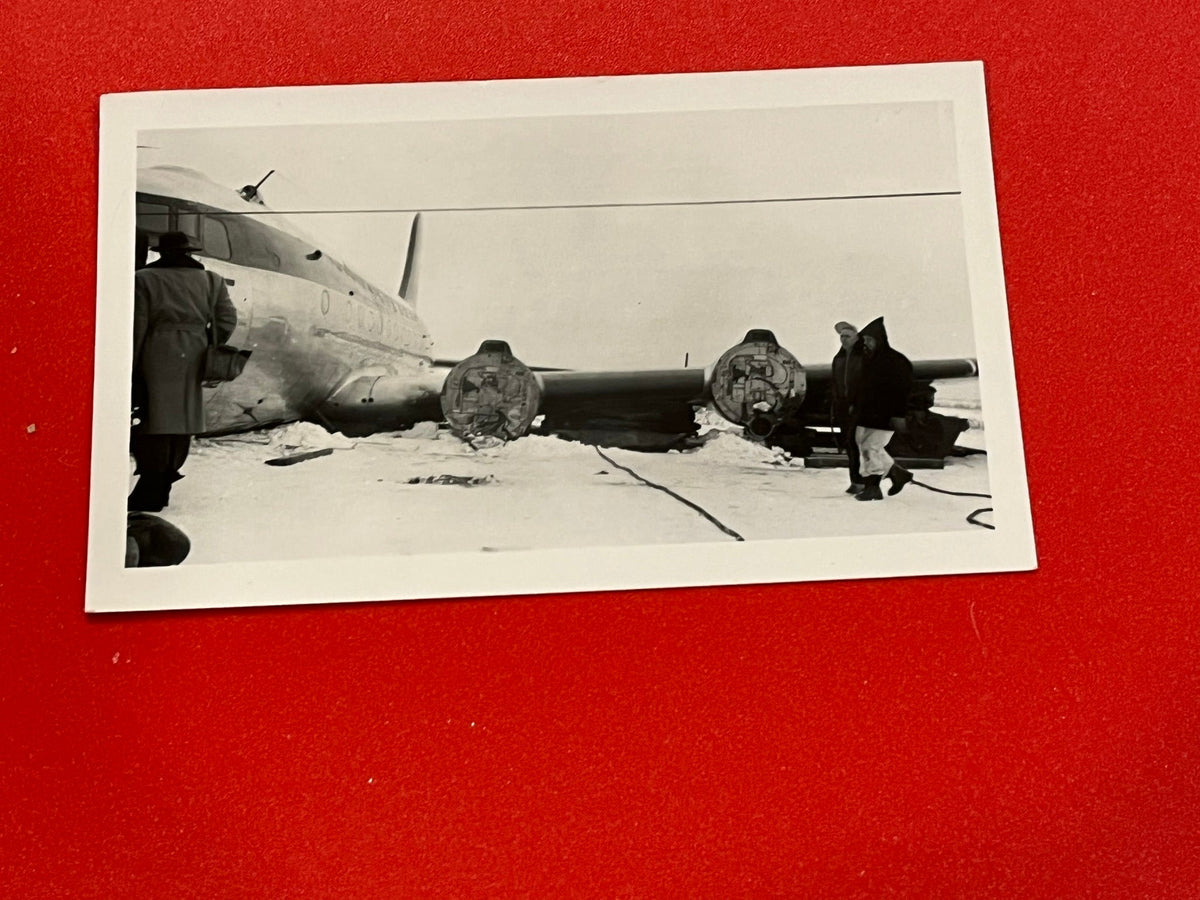 Northwest Orient Airlines Plane being taken apart 1946 ca.