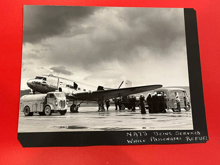 NATS being Serviced while passengers refuel- 1943